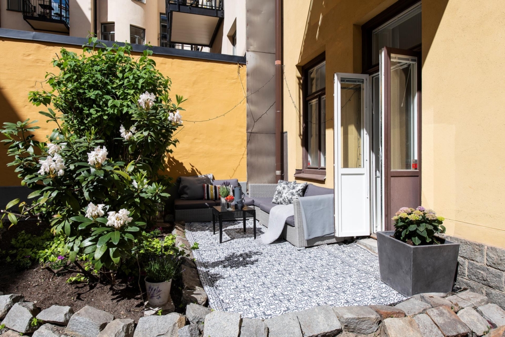 Magisk sekelskiftestrea med solig uteplats!